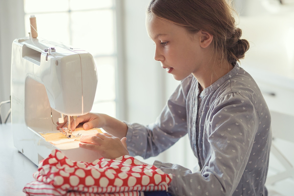 Learning how to sew baby and child clothes with a sewing machine